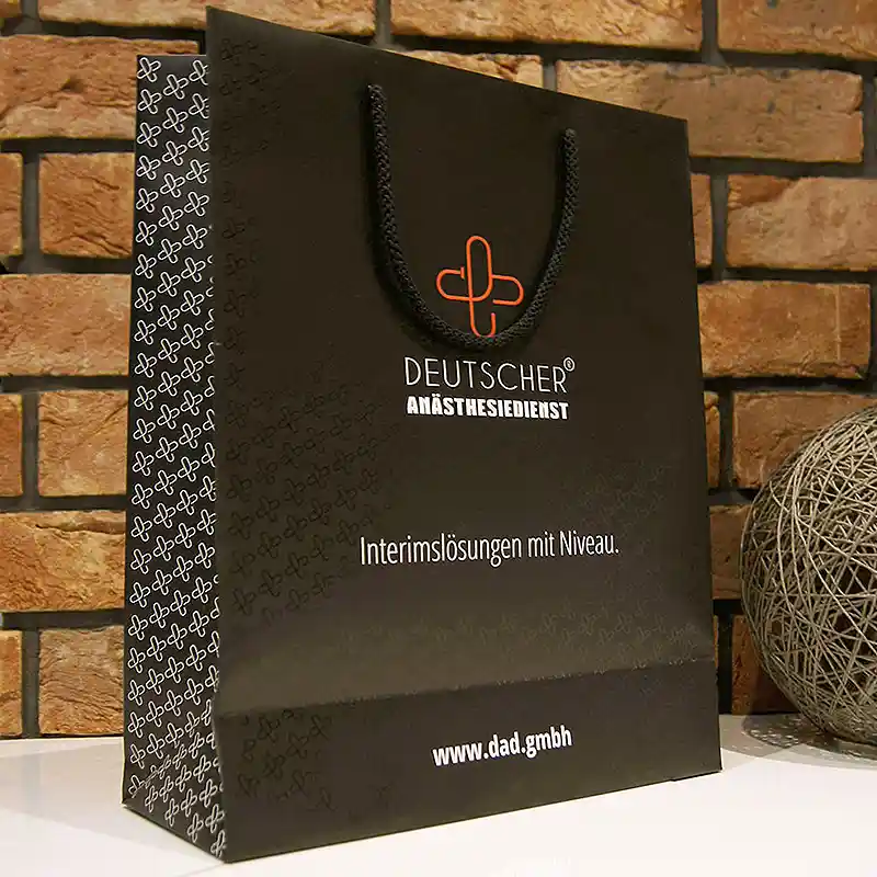 Matte laminated paper bag with an advertising print